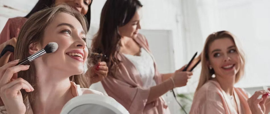 four beautiful lady is making up